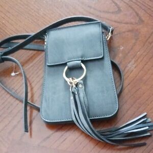 Sleek Black Crossbody Bag with Gold Accents